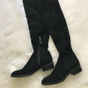 Over the knee boots side zip excellent condition .